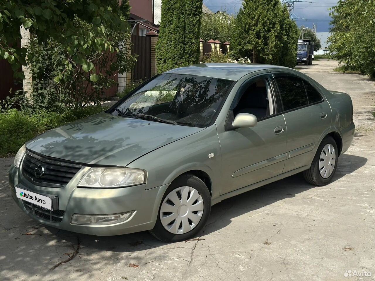 Nissan Almera Classic 1.6 AT, 2011, 298 129 км, фото 1